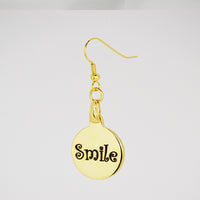 Smile Charm earring in gold back detail
