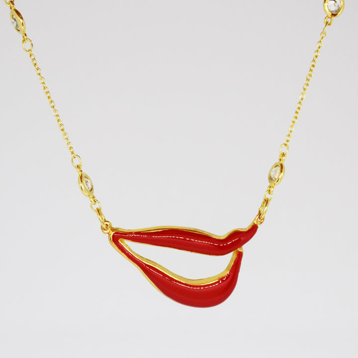 Sylvia Bennett signature lips pendant with PermaGold Chain and clear crystals