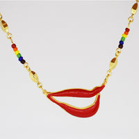 Sylvia Bennett signature lips pendant with PermaGold Chain and multi-colored beads