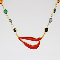 Sylvia Bennett signature lips pendant with PermaGold Chain and multi-colored crystals
