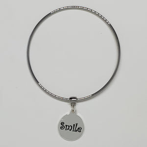 Introducing the Smile Charm Bangle Bracelet with Swarovski Crystal: Where Elegance Meets Happiness!