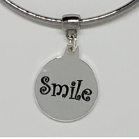 Introducing the Smile Charm Bangle Bracelet with Swarovski Crystal: Where Elegance Meets Happiness!
