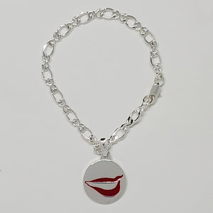 Introducing the Smile Charm Bracelet: A Timeless Emblem of Joy!