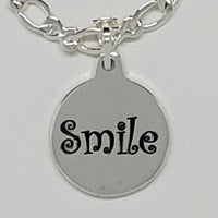 Introducing the Smile Charm Bracelet: A Timeless Emblem of Joy!